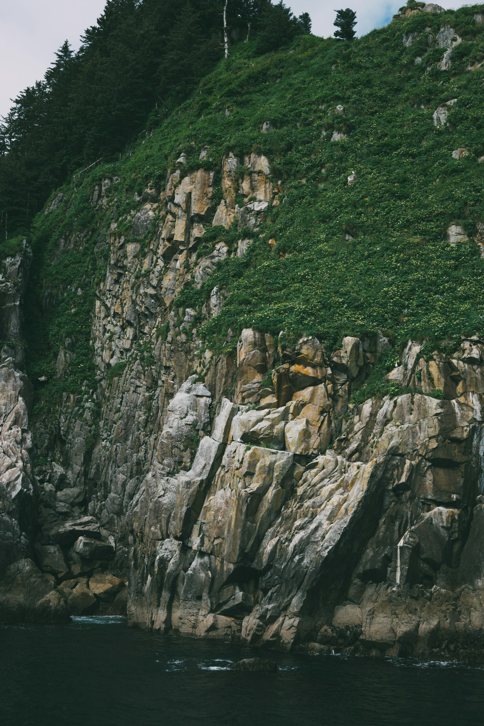 Sony a6000 + Sigma 30mm F2.8 EX DN sample photo. Rock formation beside body photography