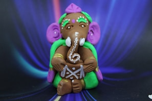 A beautifully crafted eco-friendly Ganesh idol made of natural clay.