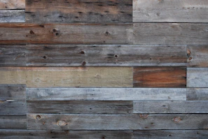 Reclaimed wood wall art with natural textures and earthy tones.