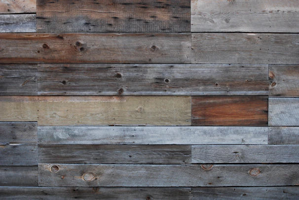 Rustic wooden panel with natural grain and paint marks used in artwork