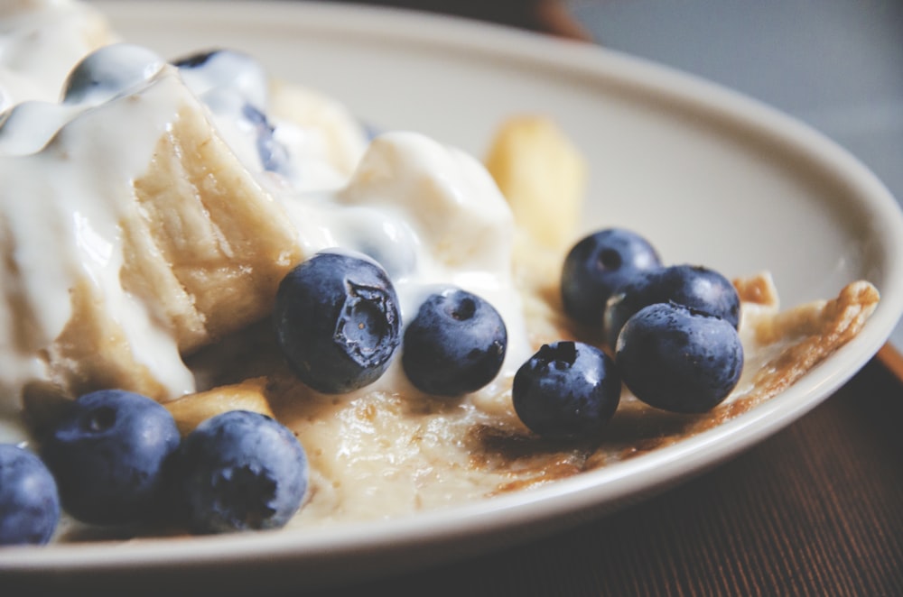 bowl of blue berries with cream