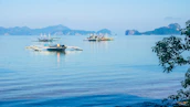 A serene view of a traditional boat sailing near Labuan Bajo islands.