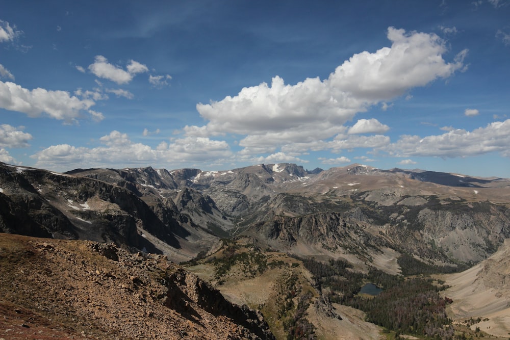 brown mountain terrain under clear sky