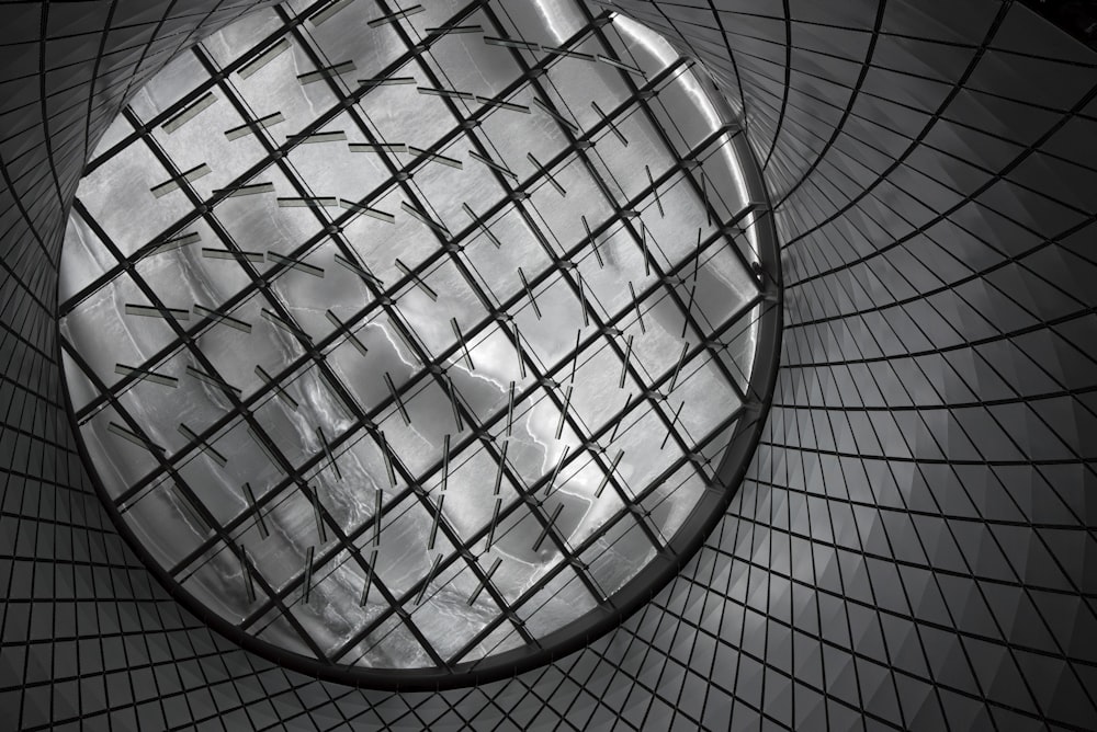 round gray mesh container close up photography