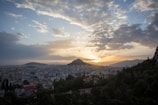 Panoramic view of Addis Ababa skyline at sunset with hills in the background.