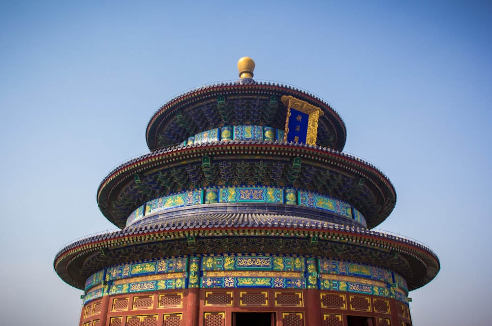 low-angle photography of 3-tier pagoda
