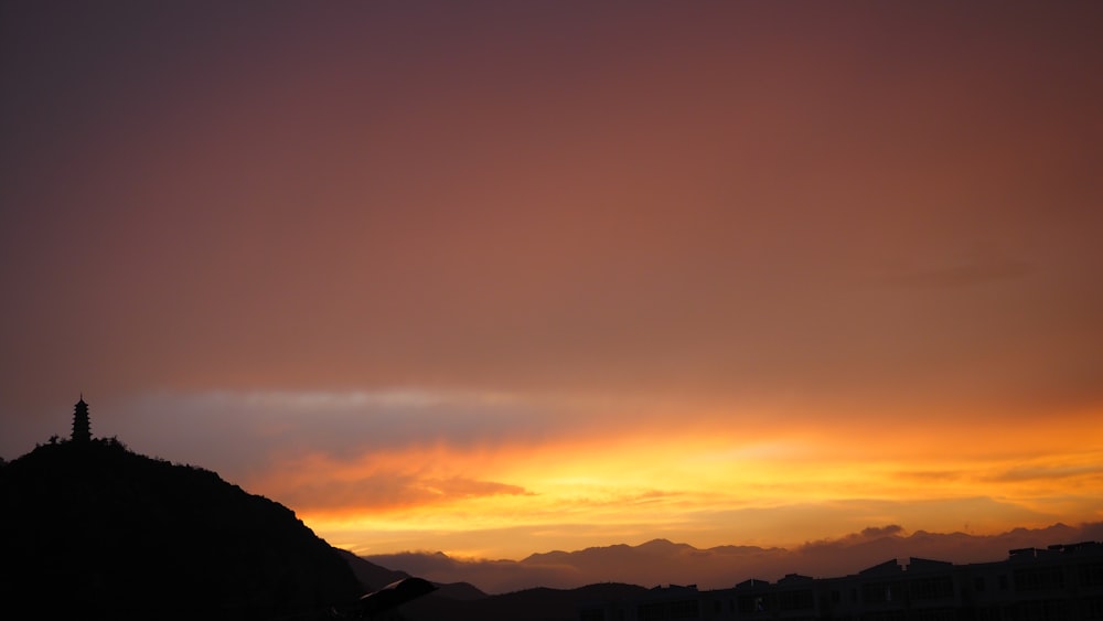 golden hour photography of hills