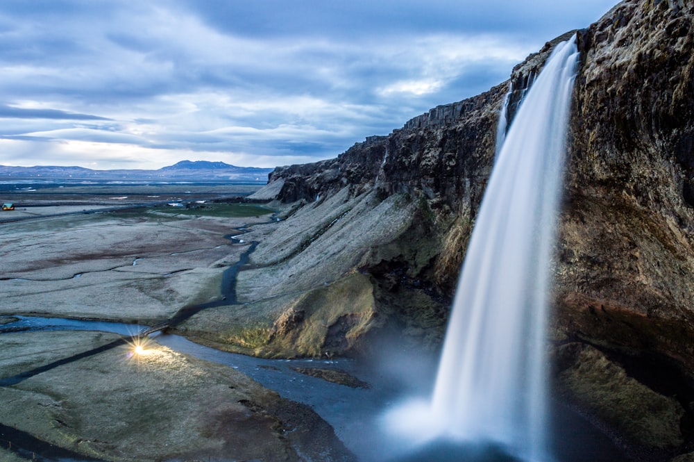 timelapse photography of water falls