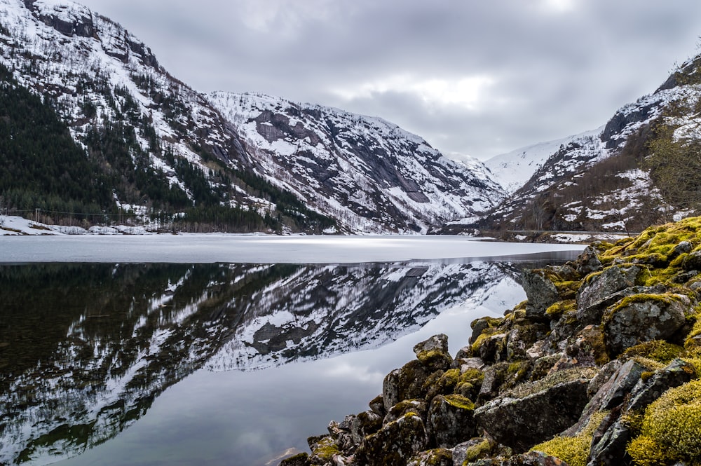 landscape photography of mountain under cloudy skty