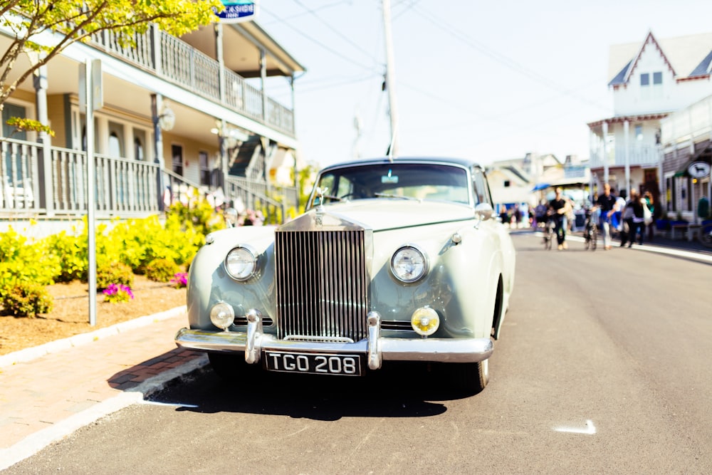 classic white vehicle on concrete road