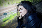 woman sitting outdoor during daytime