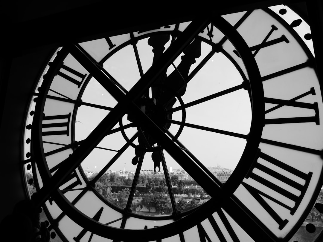 Tower clock in black and white.