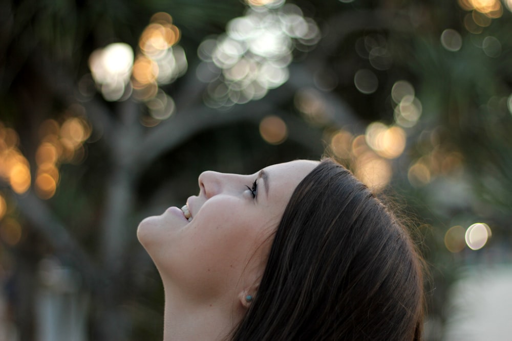 woman looking at the sky during day