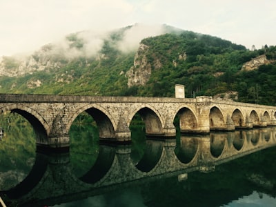 brown concrete bridge during day time bosnia and herzegovina zoom background