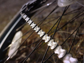 Detail of a bike’s shiny chain and gears catching the light