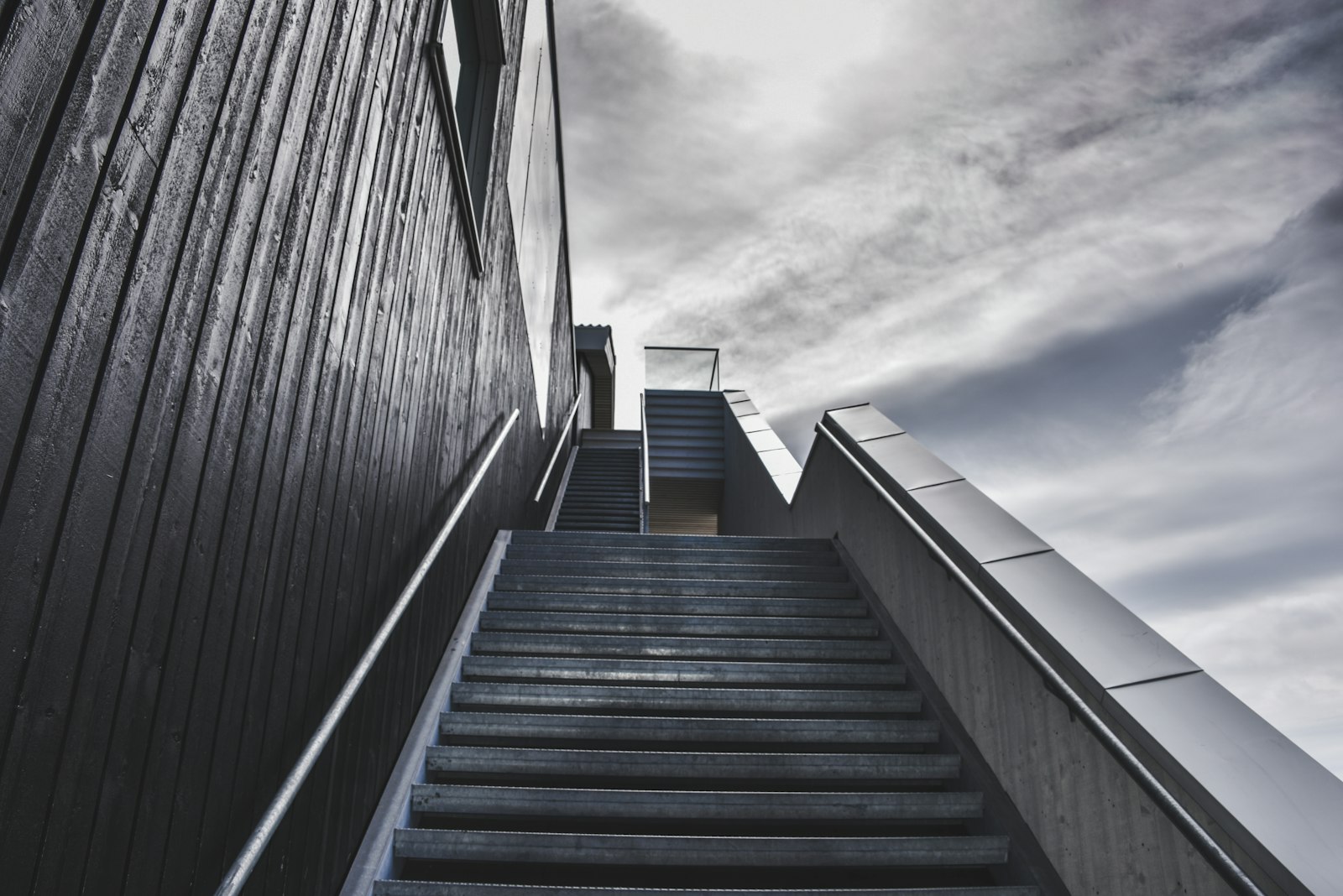 Nikon D750 + Nikon AF-S Nikkor 28-300mm F3.5-5.6G ED VR sample photo. Ladder near building under photography