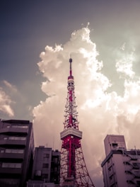 red and whtie metal tower erections