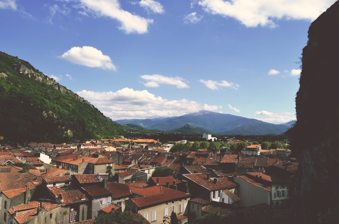 panoramic photography of village between mountains