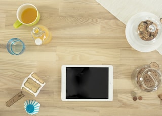 white iPad on table