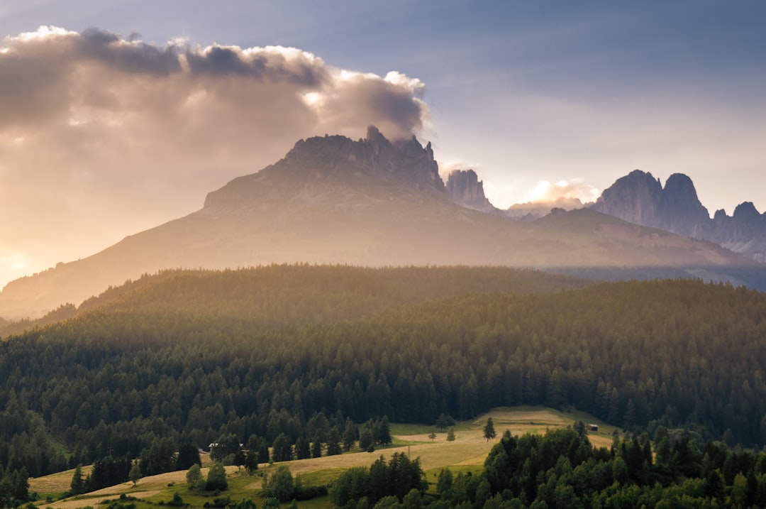 mountain surrounded by trees, Clouds in the Dolomites