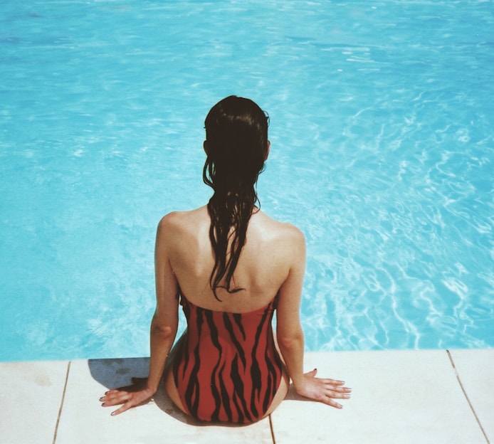 woman wearing black and red monokini