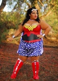 A female superhero costume inspired by Wonder Woman, featuring bold colors and shiny accents.