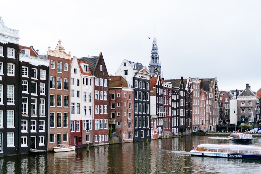 colorful buildings beside a canal