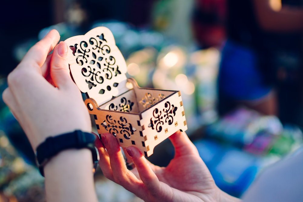 woman opens empty cut-out box