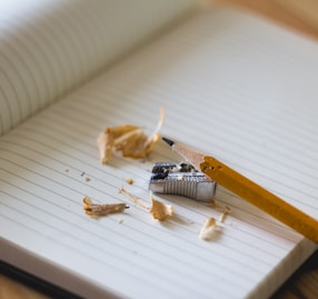 pencil and sharpener on notebook page