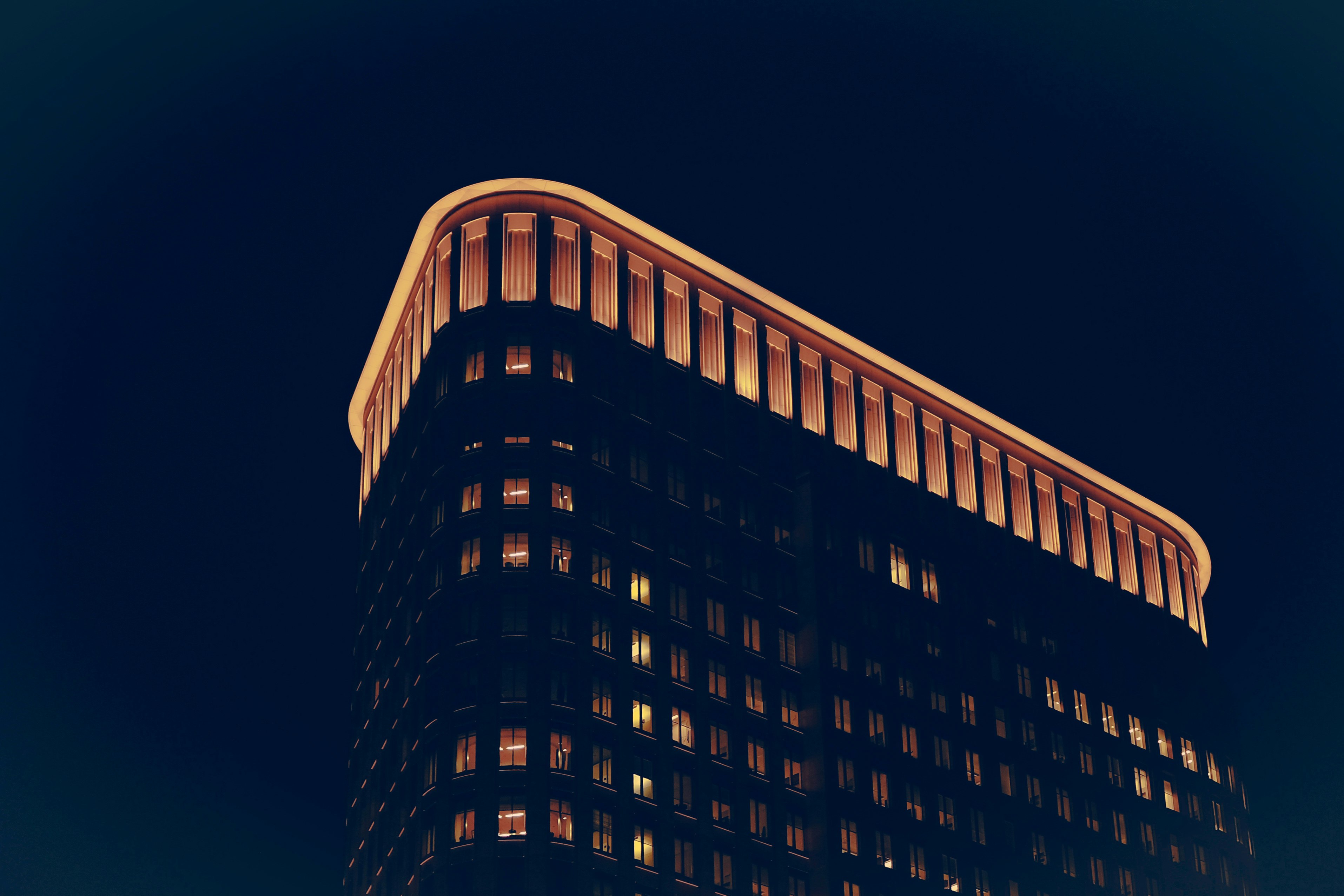 low angle photo of building at nighttime