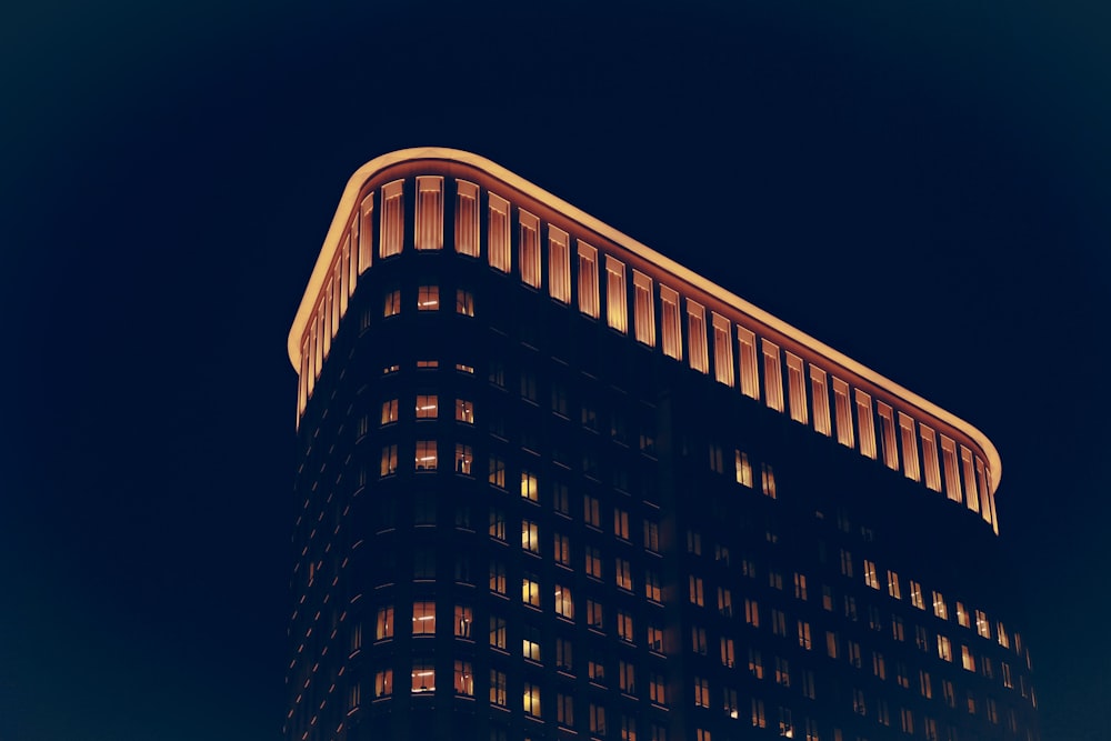 low angle photo of building at nighttime