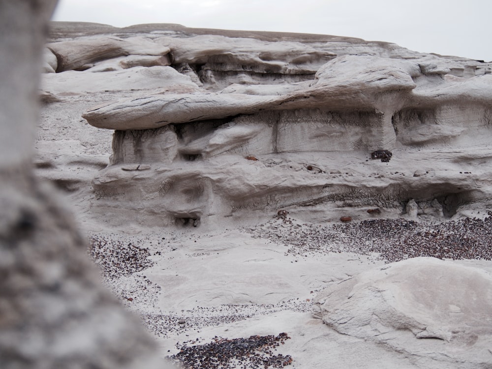 a rock formation in the middle of a desert