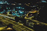 Night view of a highway lit by Ushine Solartech’s engineering solar street lights.