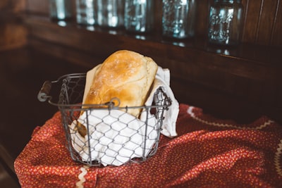 brown toast bread in gray steel basket arkansas teams background