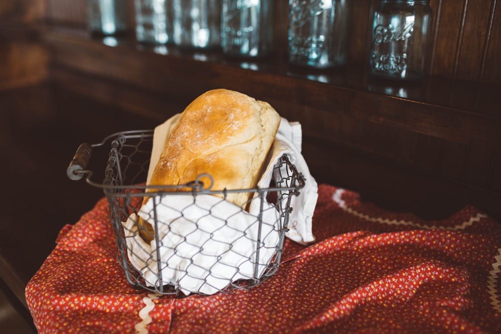 brown toast bread in gray steel basket