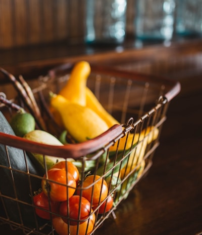 selective focus photography of vegetables in basket