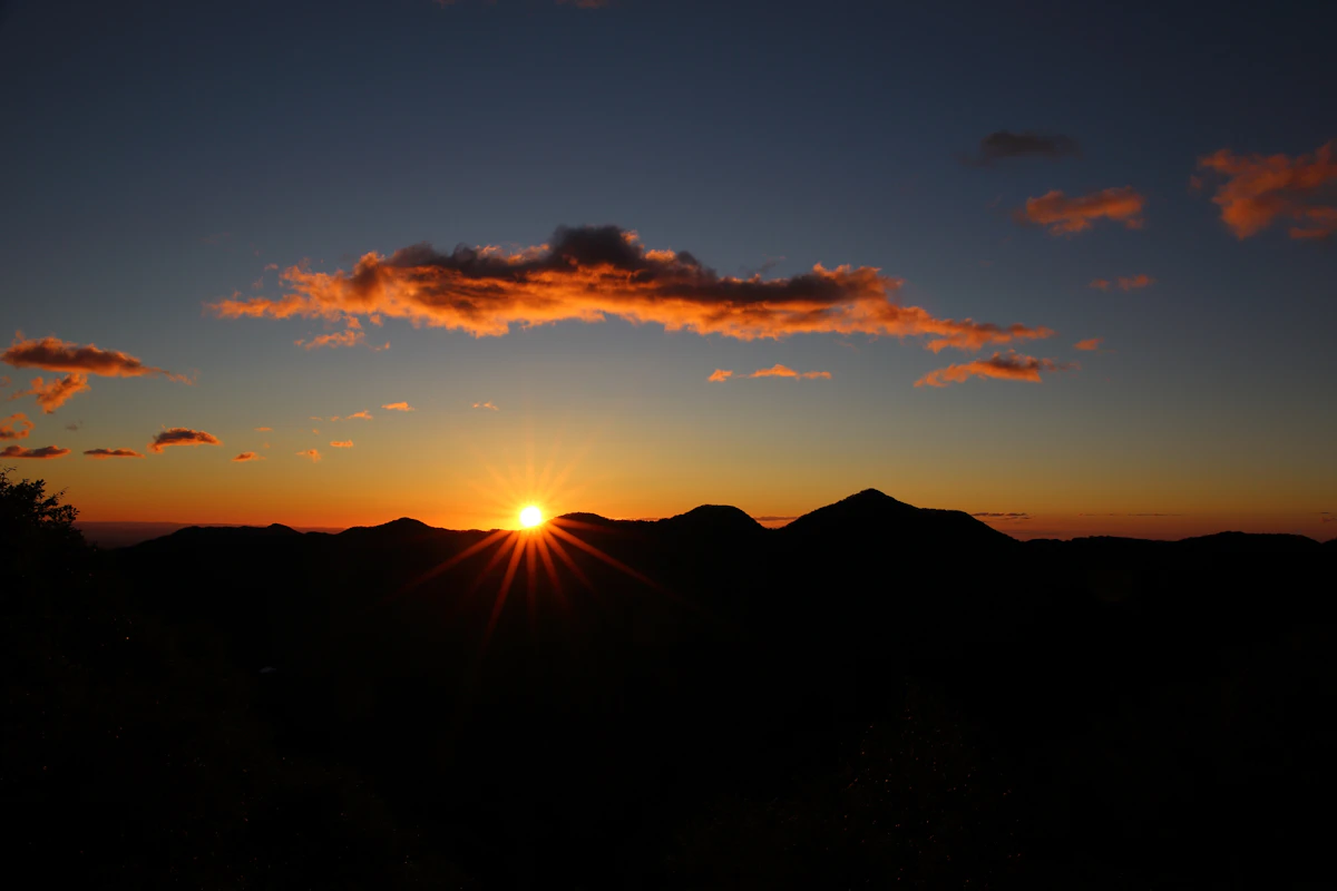 Sunrise over mountains, symbolic of vital energy and Brahmacharya