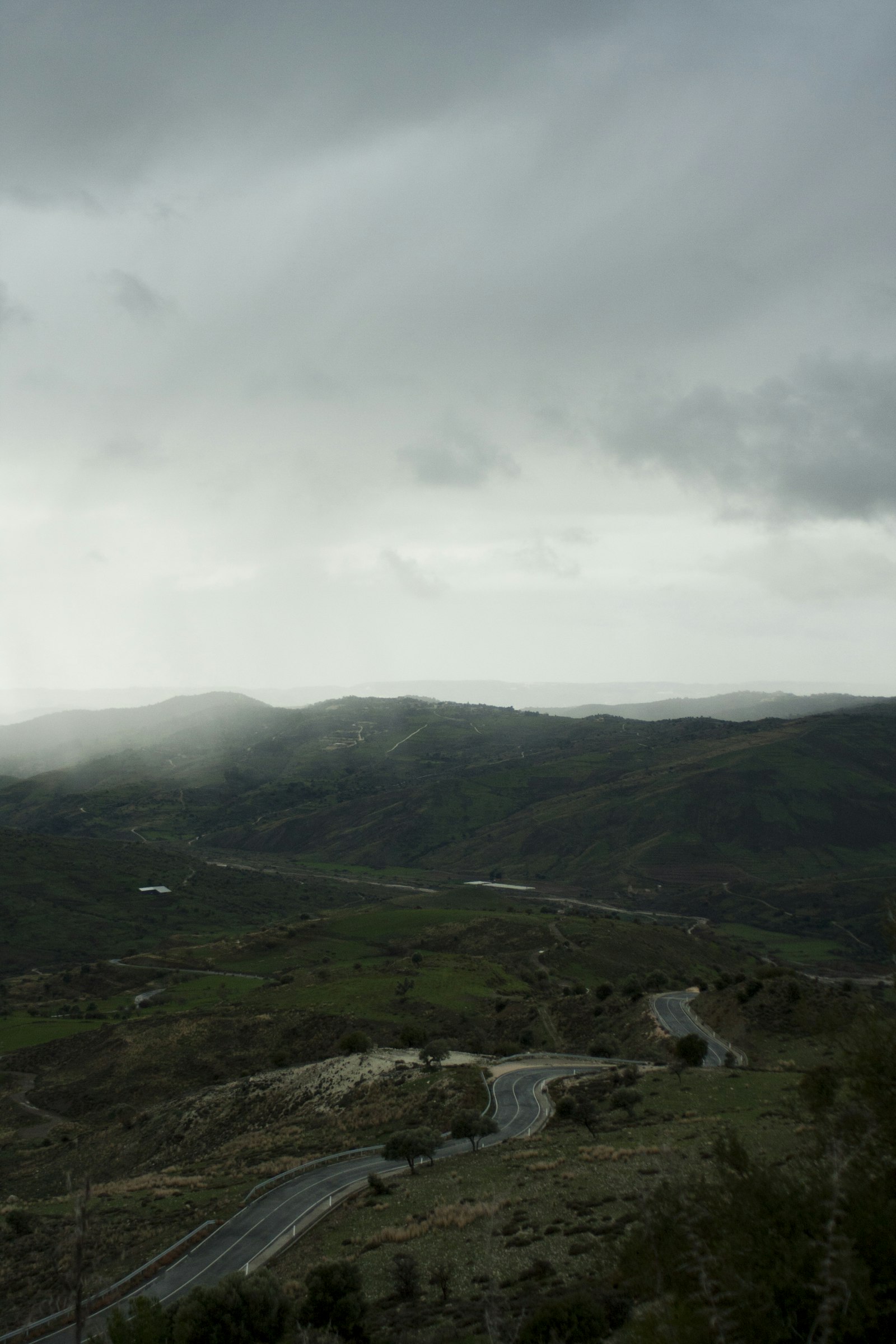 Canon EOS 40D + Canon EF 28-80mm f/3.5-5.6 sample photo. Highway near misty mountain photography