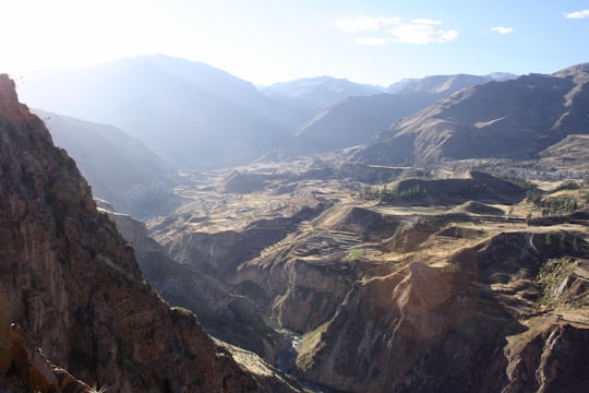aerial-view of rocky mountains during day time in Colca Canyon Peru