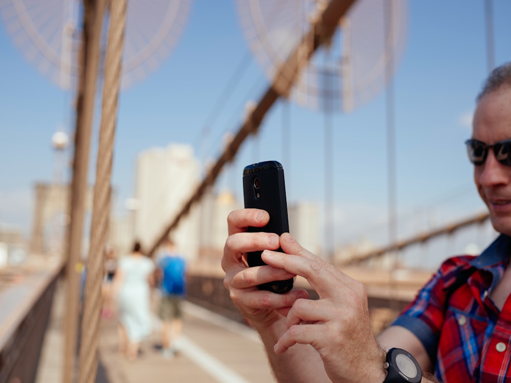 man holding smartphone