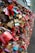 A dense collection of colorful padlocks attached to a metal fence or railing, often seen as symbols of love and commitment.
