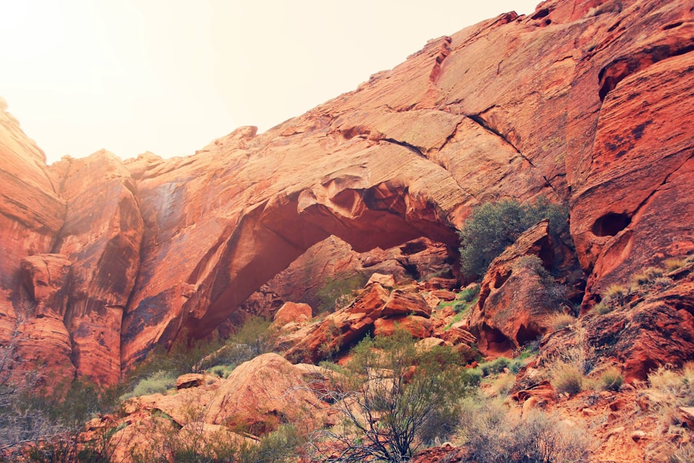 brown rock formation under white sky during daytime