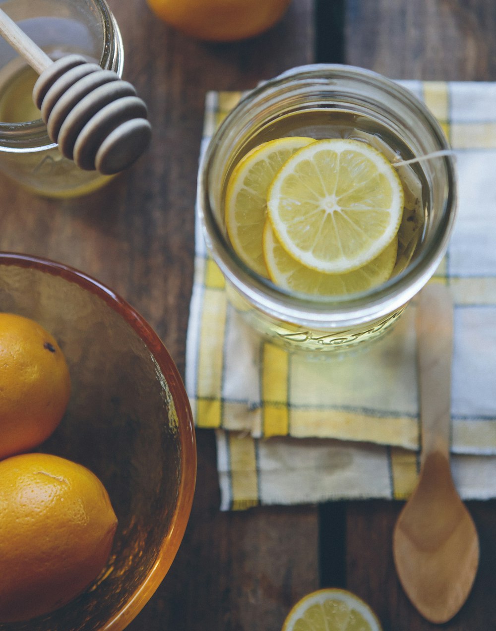 clear glass container with lemon slices
