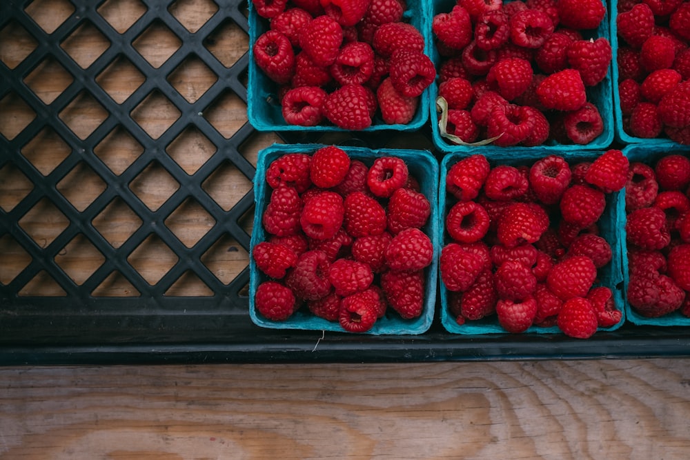 bunch of strawberries in containers