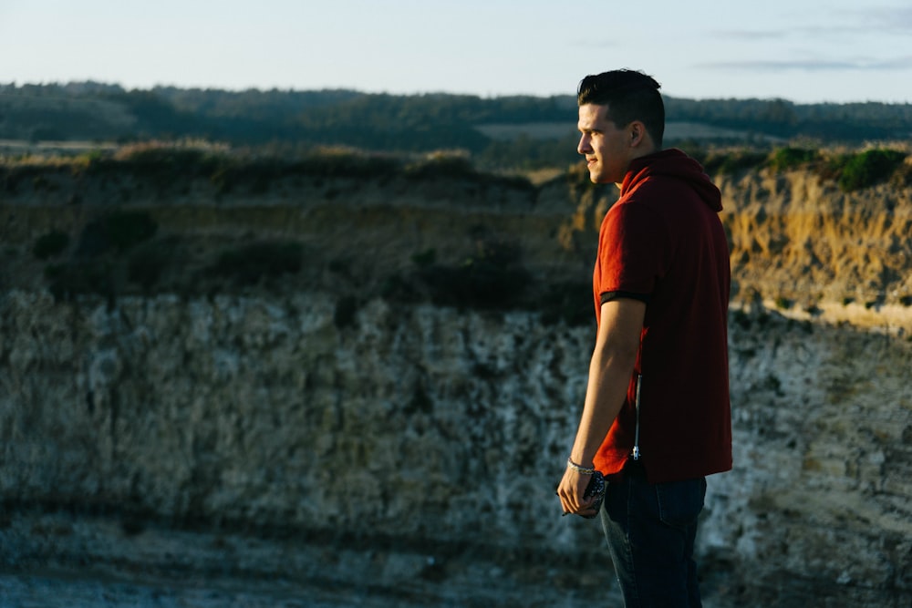 man wearing red shirt