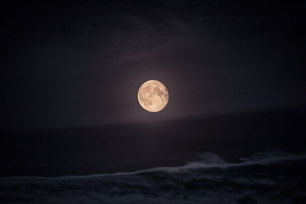 photography of moon at night time