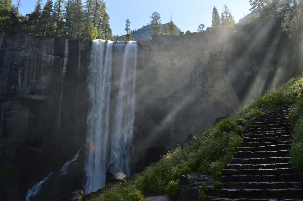man-made stairs near waterfalls