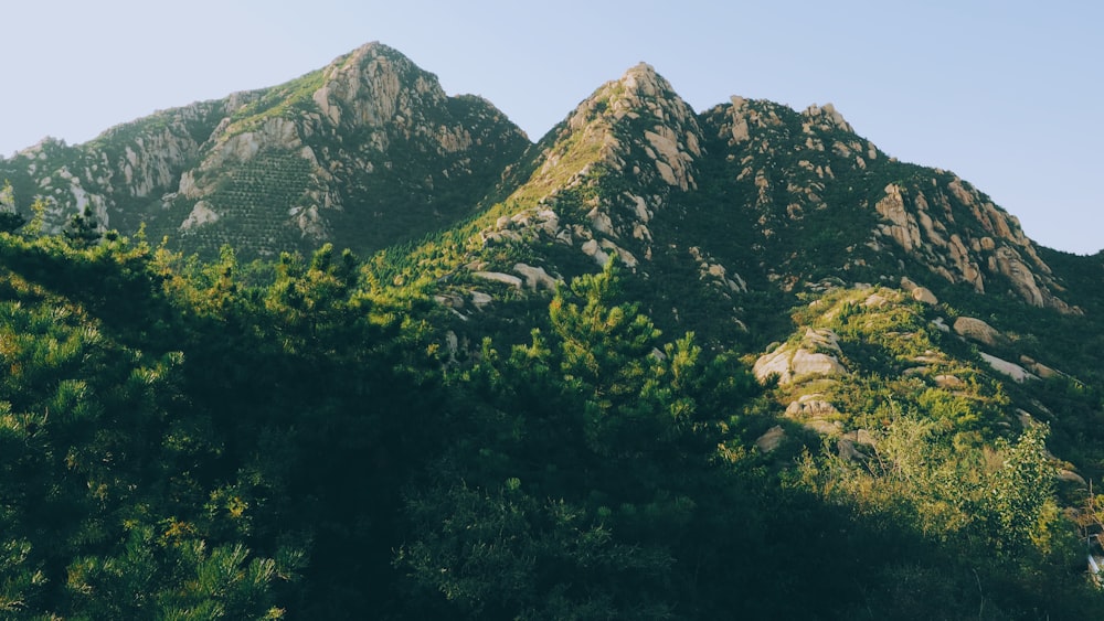 green mountain during sunrise