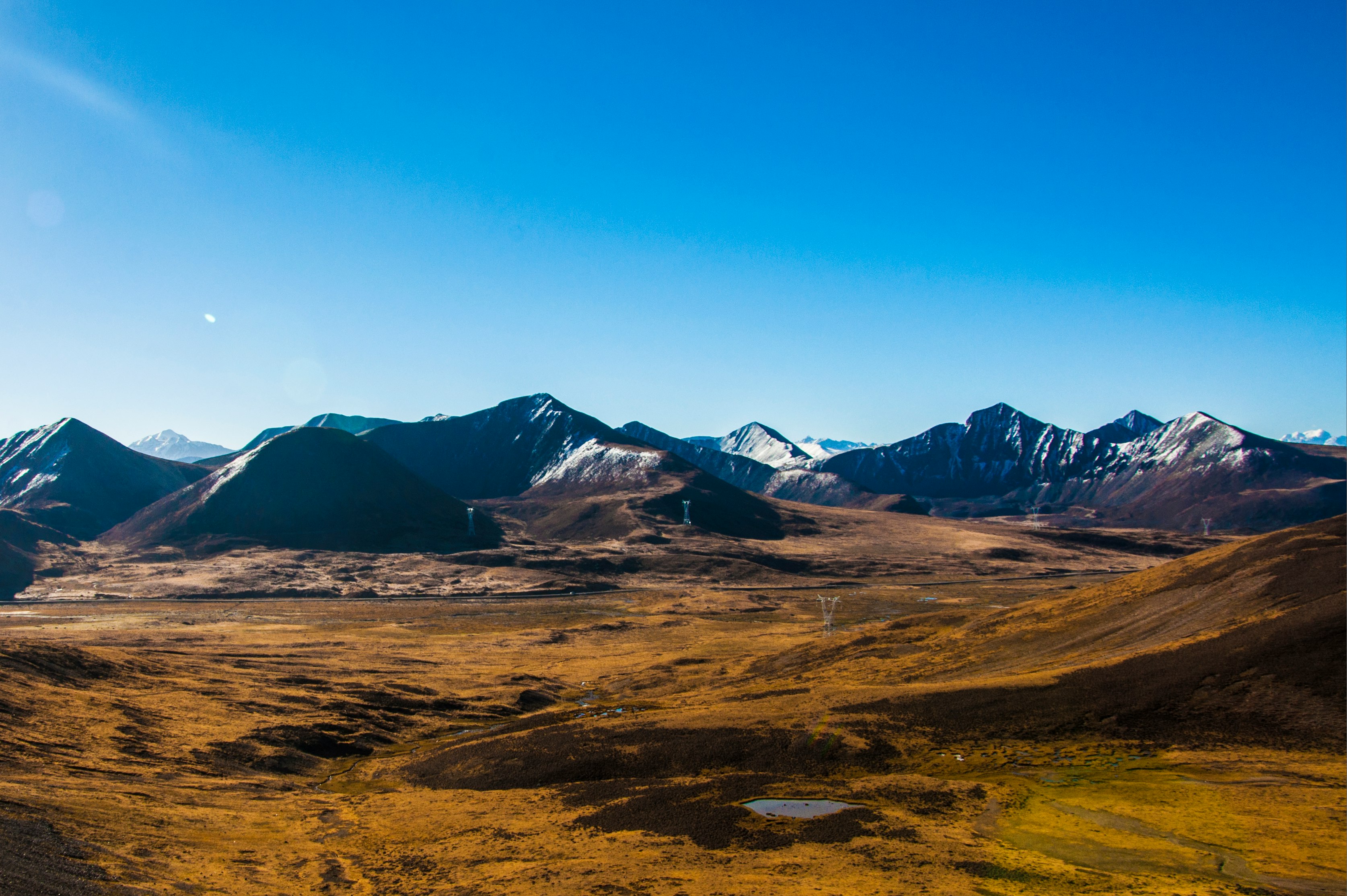 aerial photography of snow-capped mountain range