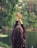 woman raising both of her hands